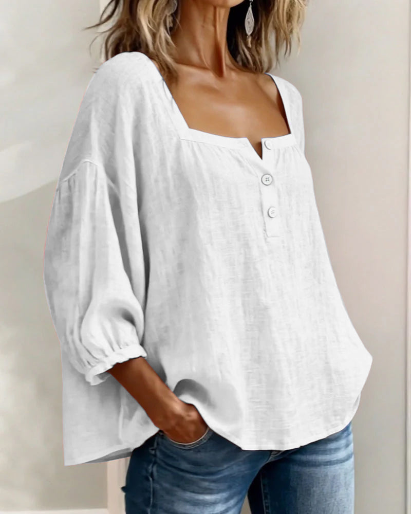 Amelia: blusa sencilla con cuello cuadrado y mangas largas