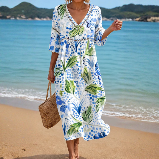 VESTIDO DE PLAYA CON ESTAMPADO TROPICAL