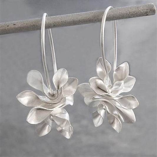 Pendientes de plata vintage con flor irregular