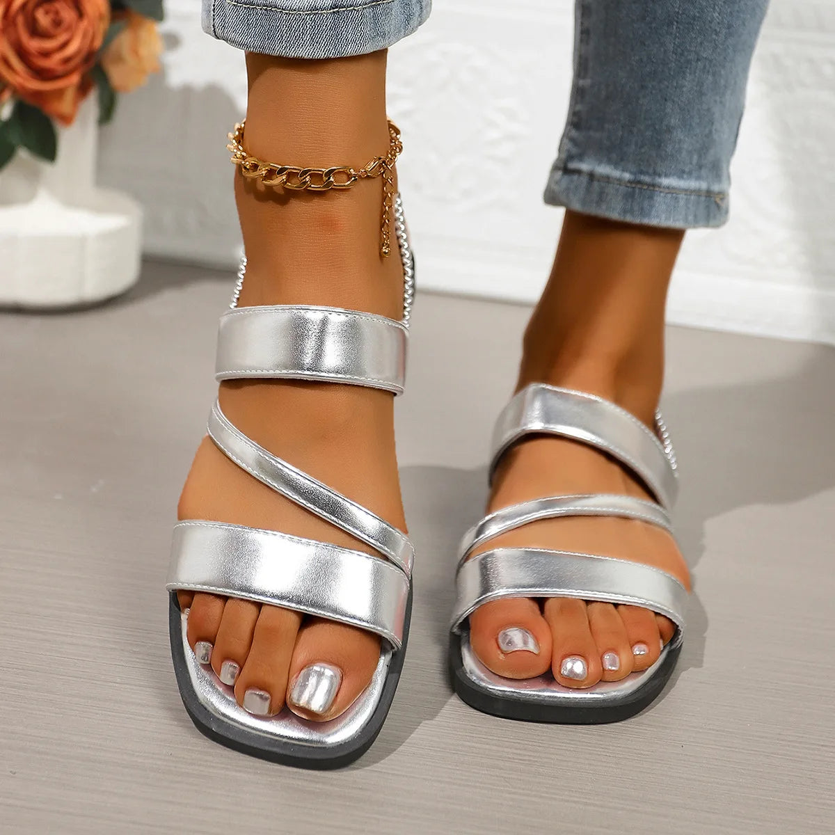 Sandalias planas destalonadas para mujer