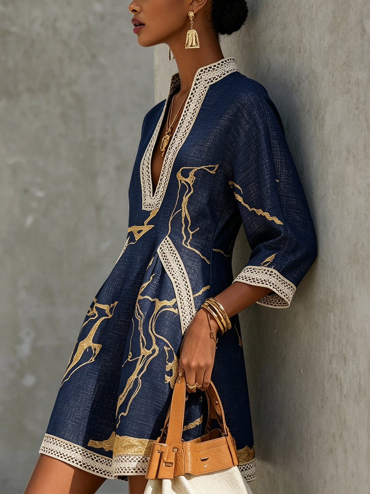 COSETTE | VESTIDO MINI DE ENCAJE AZUL MARINO Y DORADO