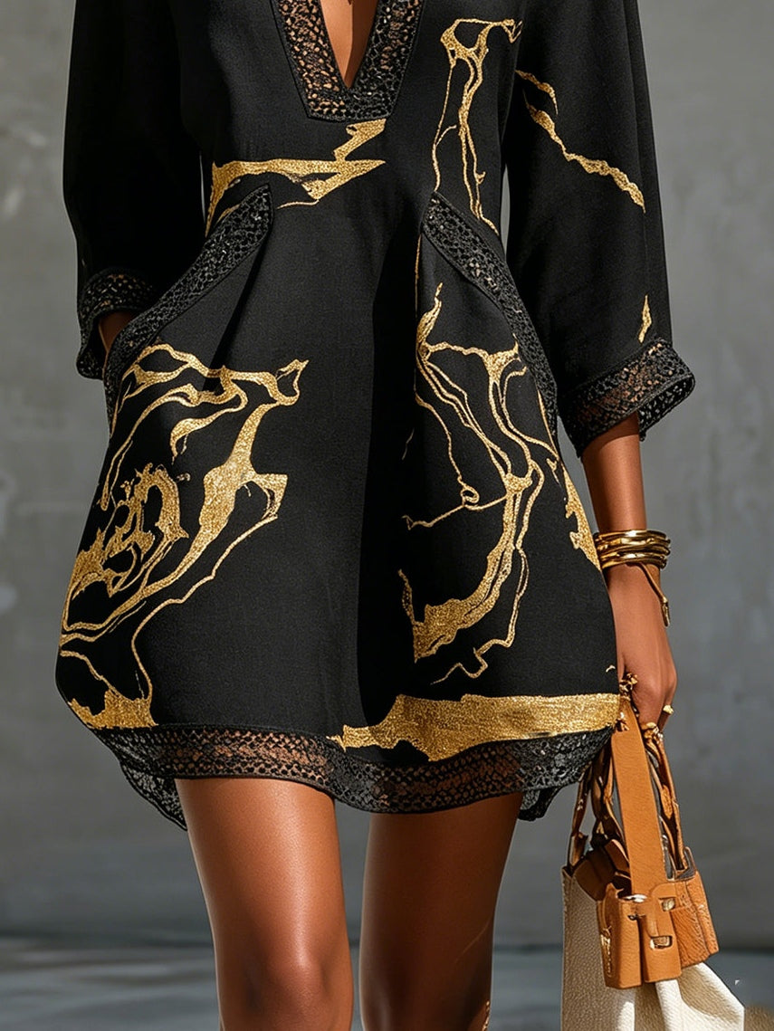 LEON | VESTIDO MINI DE ENCAJE NEGRO Y DORADO