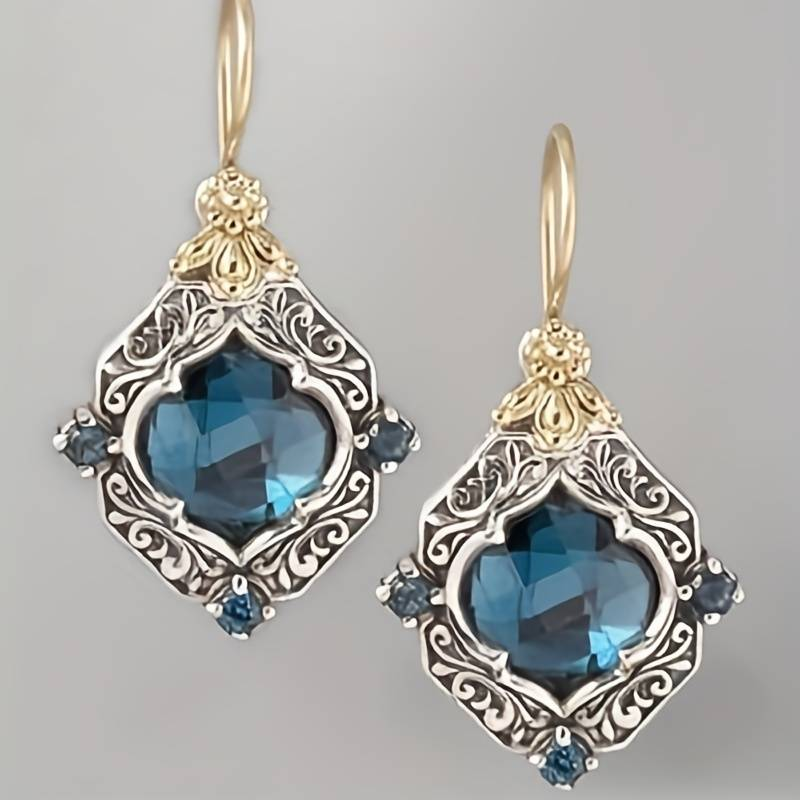 Pendientes vintage de cristal azul en oro y plata