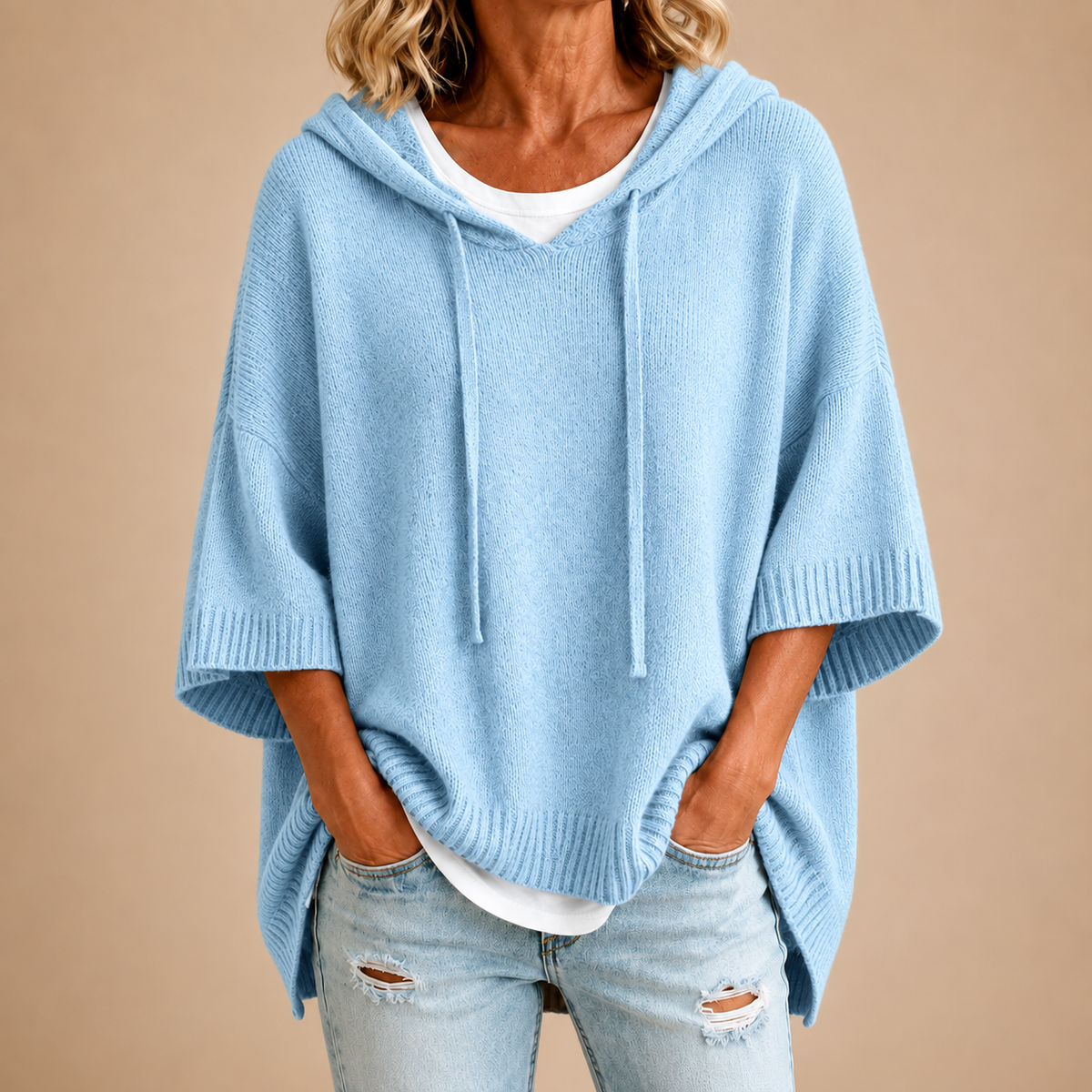 Poncho en maille à capuche bleu clair