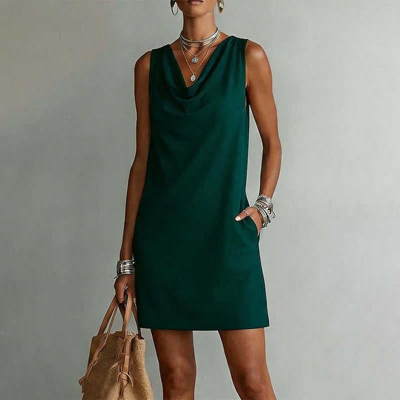 👗 ¡50 % de descuento ahora! ⏰ Elegante vestido entallado con cuello drapeado – Sin mangas, con bolsillos laterales y muy versátil – Caída favorecedora, perfecto para el trabajo o salidas nocturnas – Cómodo y chic ✨🌸